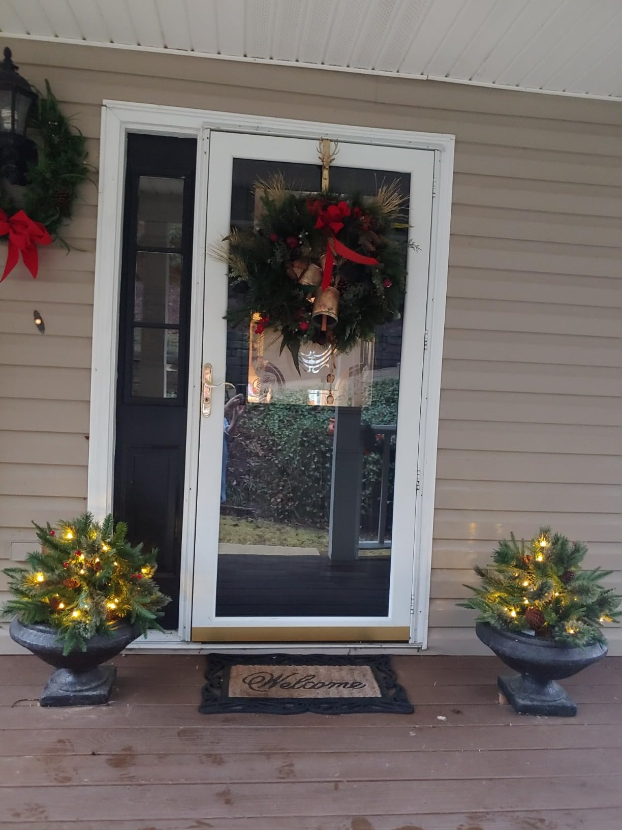 Pre-lit Artificial Christmas Tree Urn Filler / Weatherproof sparkle for entryways and patios.