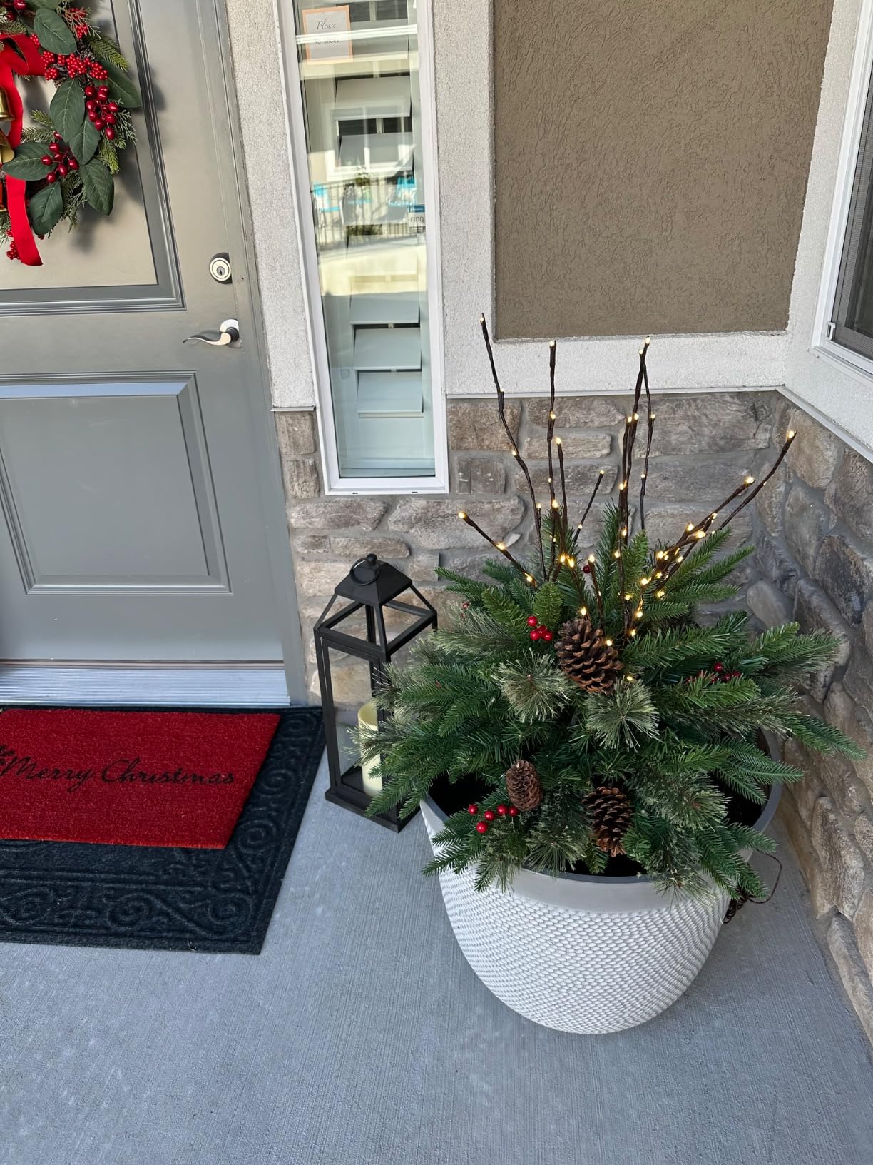 Pre-lit Artificial Christmas Tree Urn Filler / Weatherproof sparkle for entryways and patios.